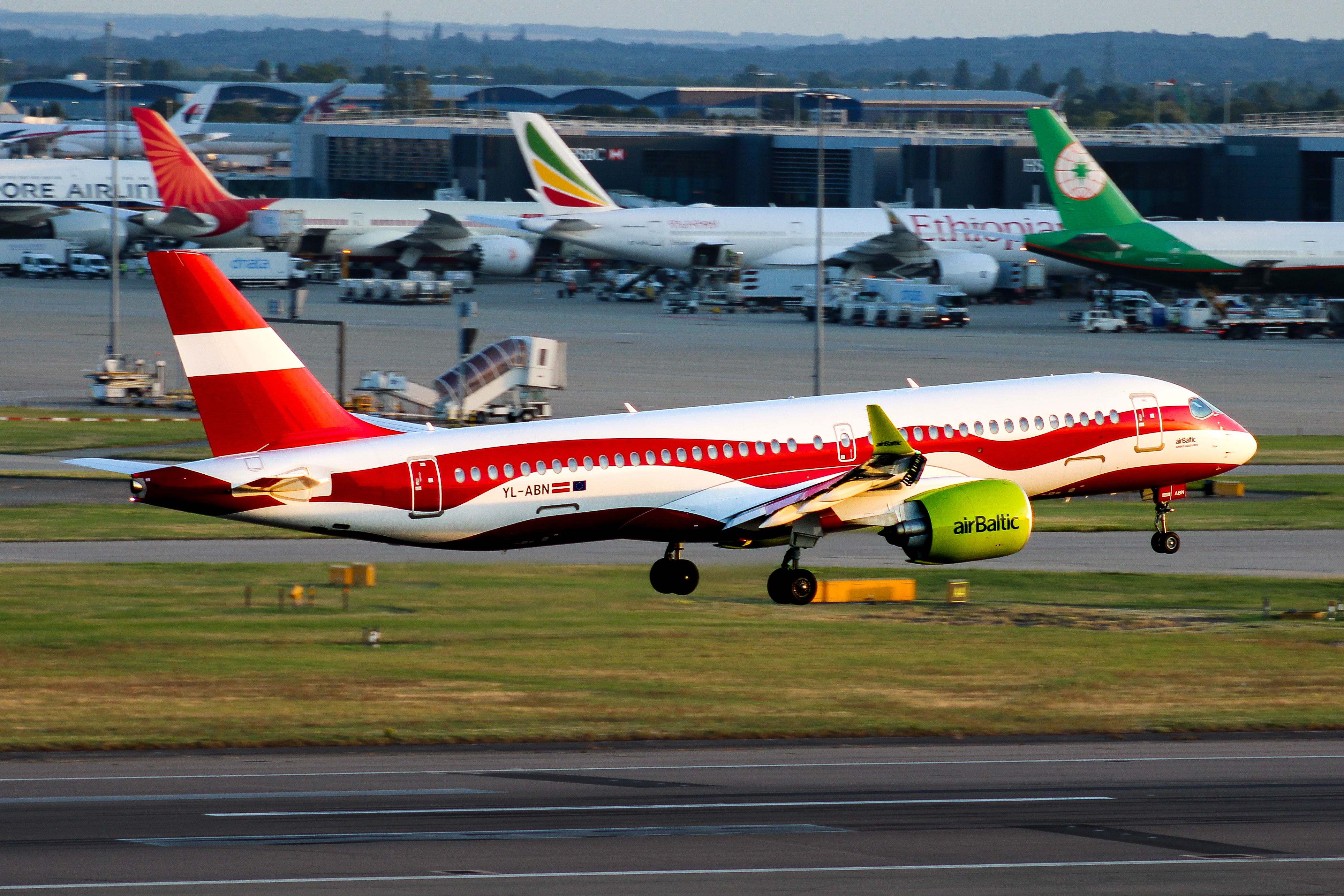 Full size: Air Baltic Airbus A220-300 YL-ABN at London Heathrow International Airport