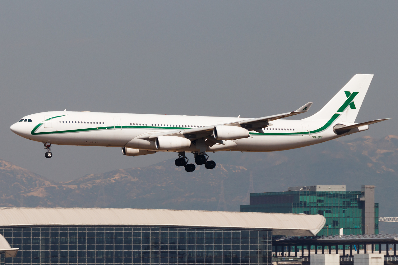Full size: Air X Charter Airbus A340-300 9H-BIG at Hong Kong International Airport