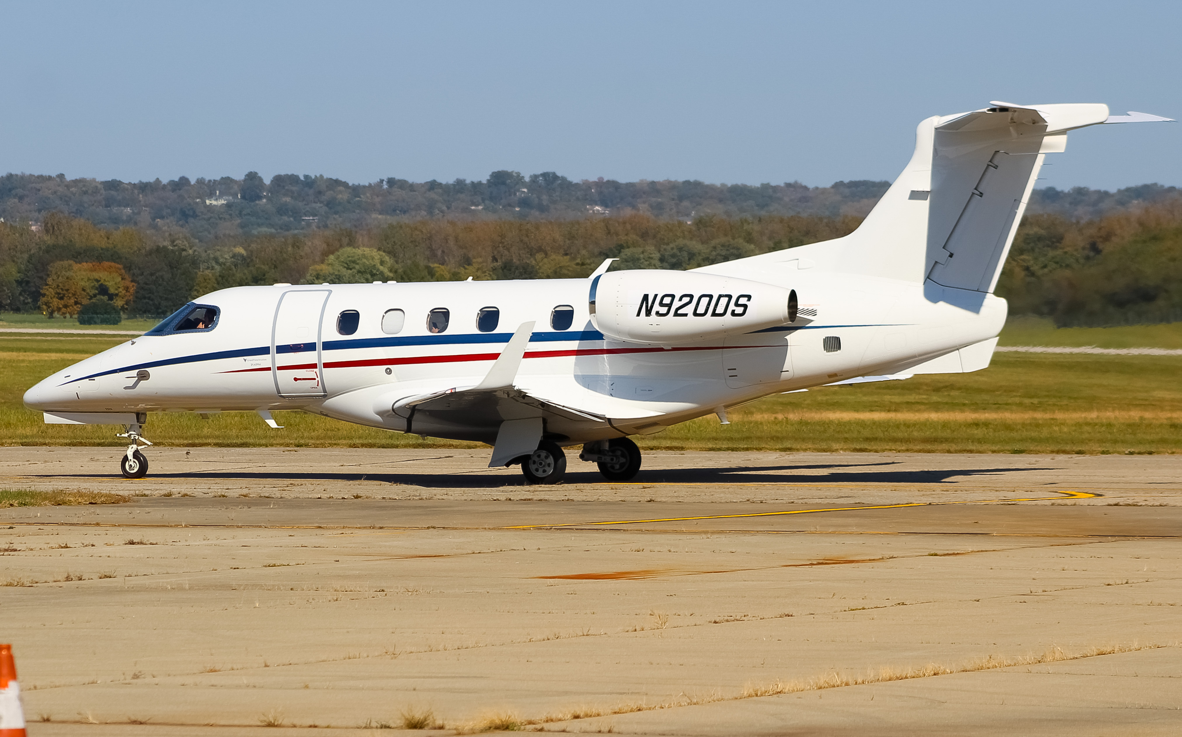 Full size: PRIVATE  Embraer Phenom 300 N920DS at Cincinnati Municipal Airport/Lunken Field