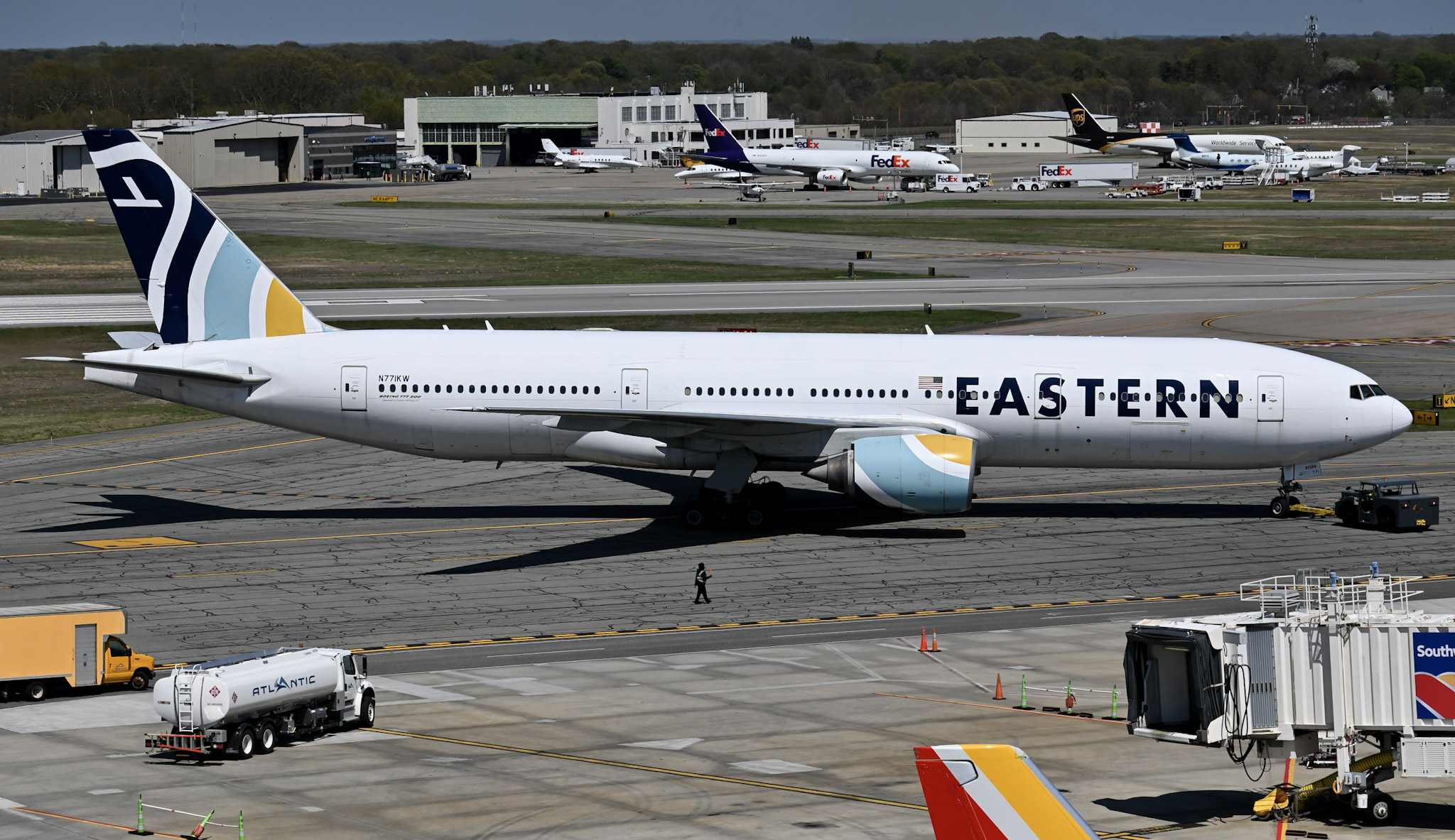 Full size: Eastern Airlines Boeing 777-200ER N771KW at Theodore Francis Green State Airport