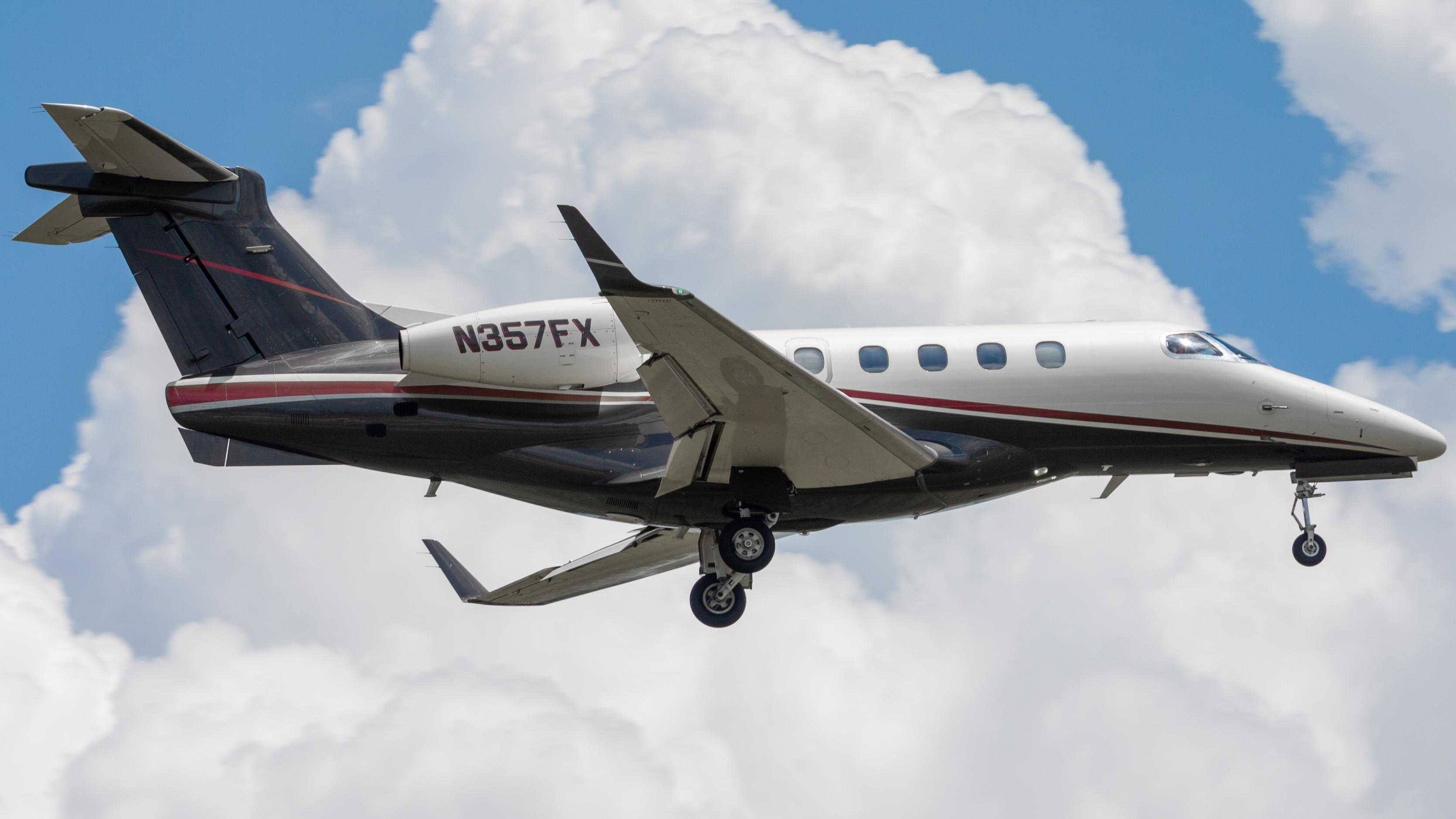 Full size: FlexJet Embraer Phenom 300 N357FX at William P Hobby Airport