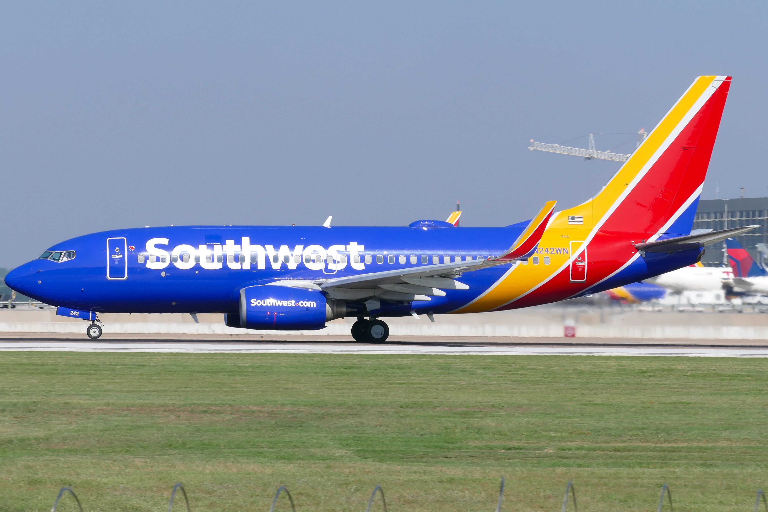Full size: Southwest Airlines Boeing 737-700 N242WN at Austin-Bergstrom International Airport