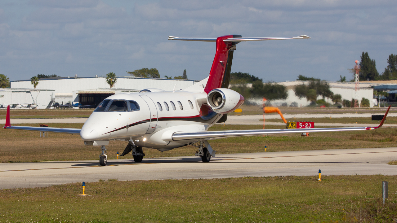 Full size: PRIVATE Embraer Phenom 300 N412N at Naples Municipal Airport