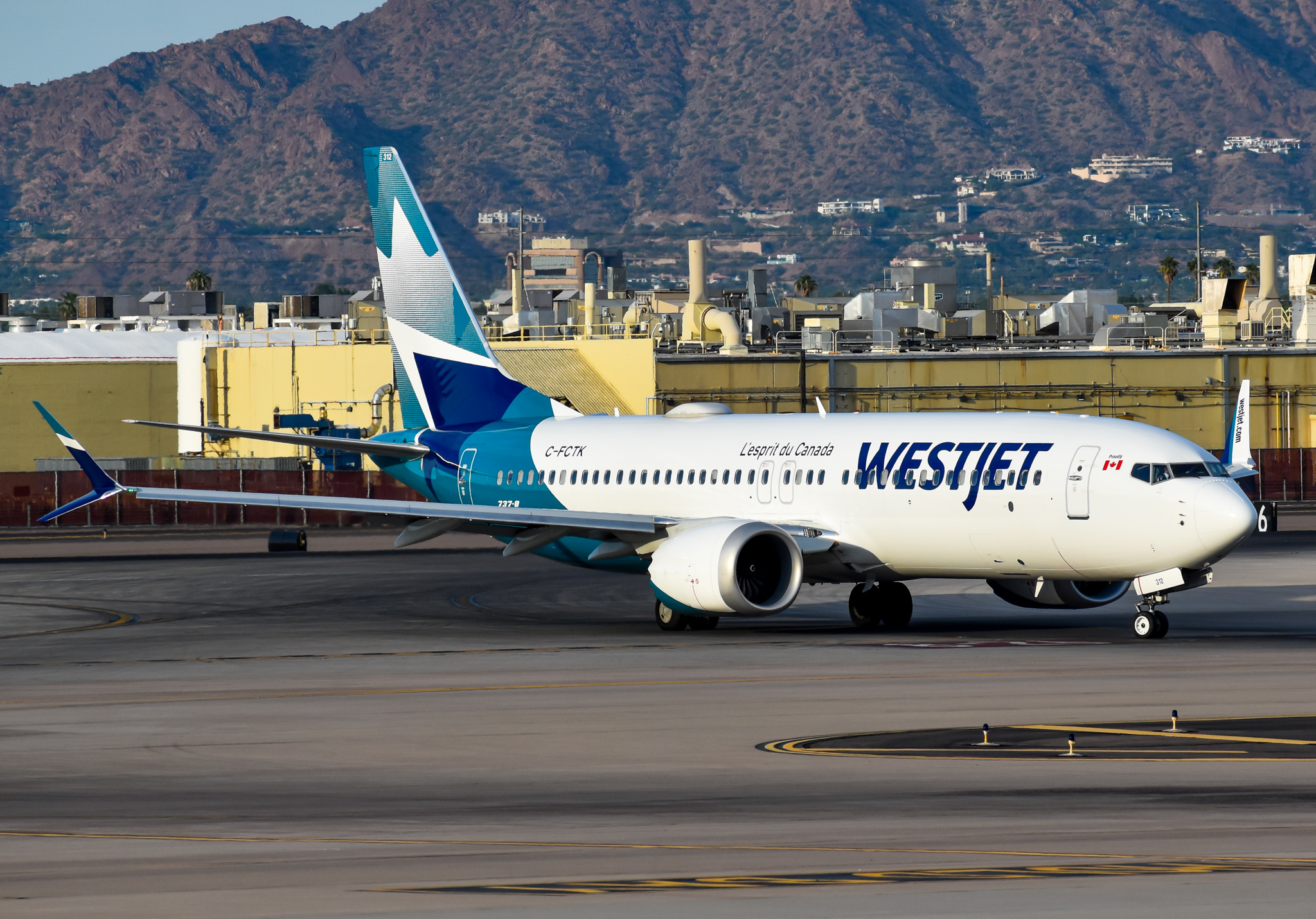Full size: WestJet Boeing 737 MAX 8 C-FCTK at Phoenix Sky Harbor International Airport