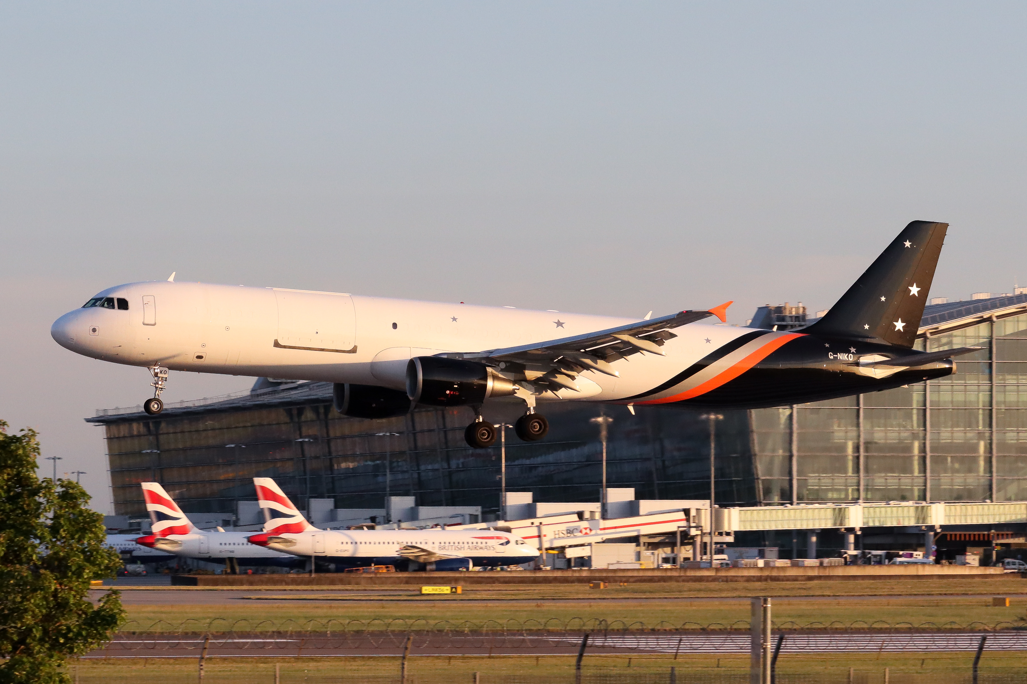 Full size: Titan Airways Airbus A321-200F G-NIKO at London Heathrow International Airport