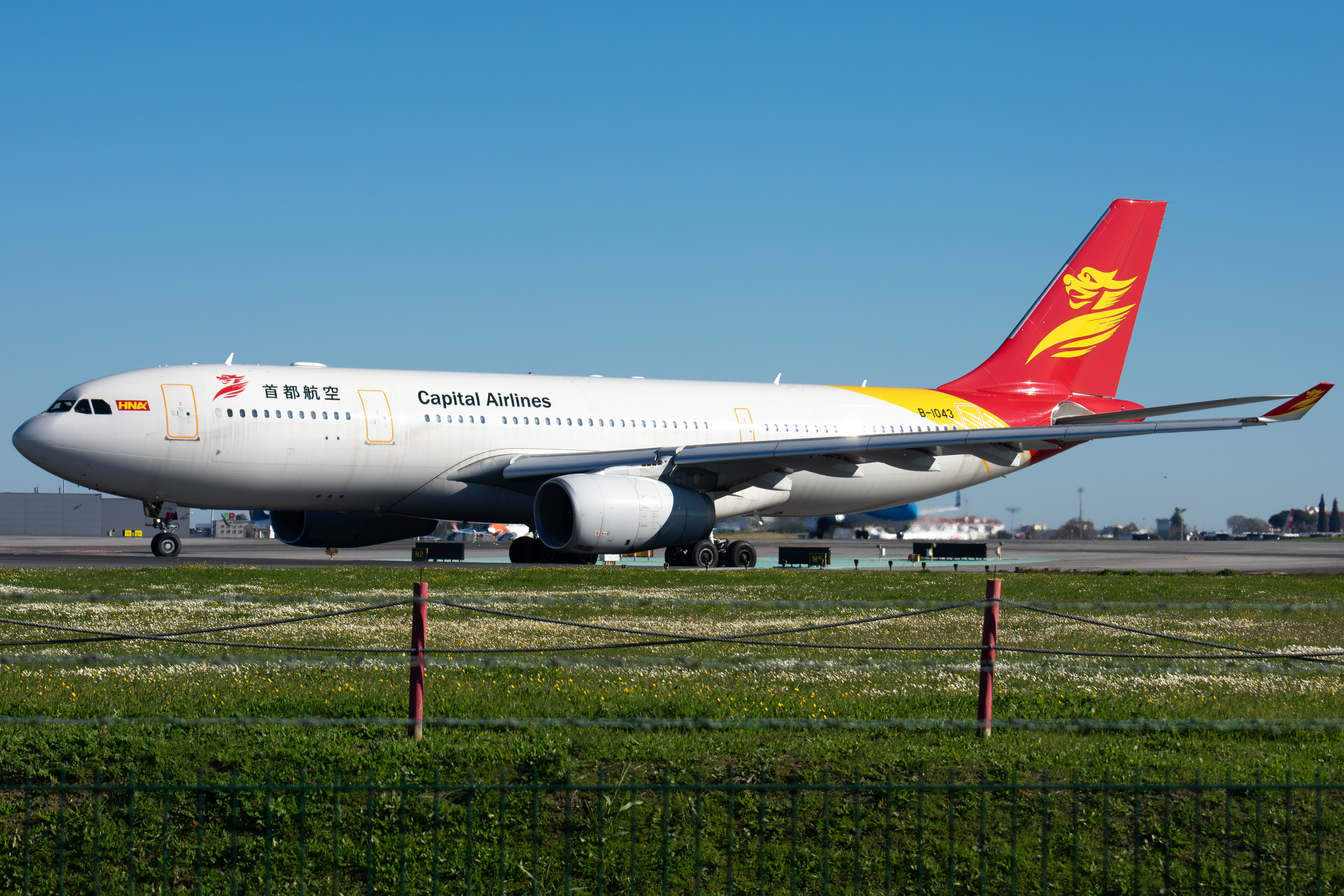 Full size: Capital Airlines Airbus A330-200 B-1043 at Lisbon Humberto Delgado Airport