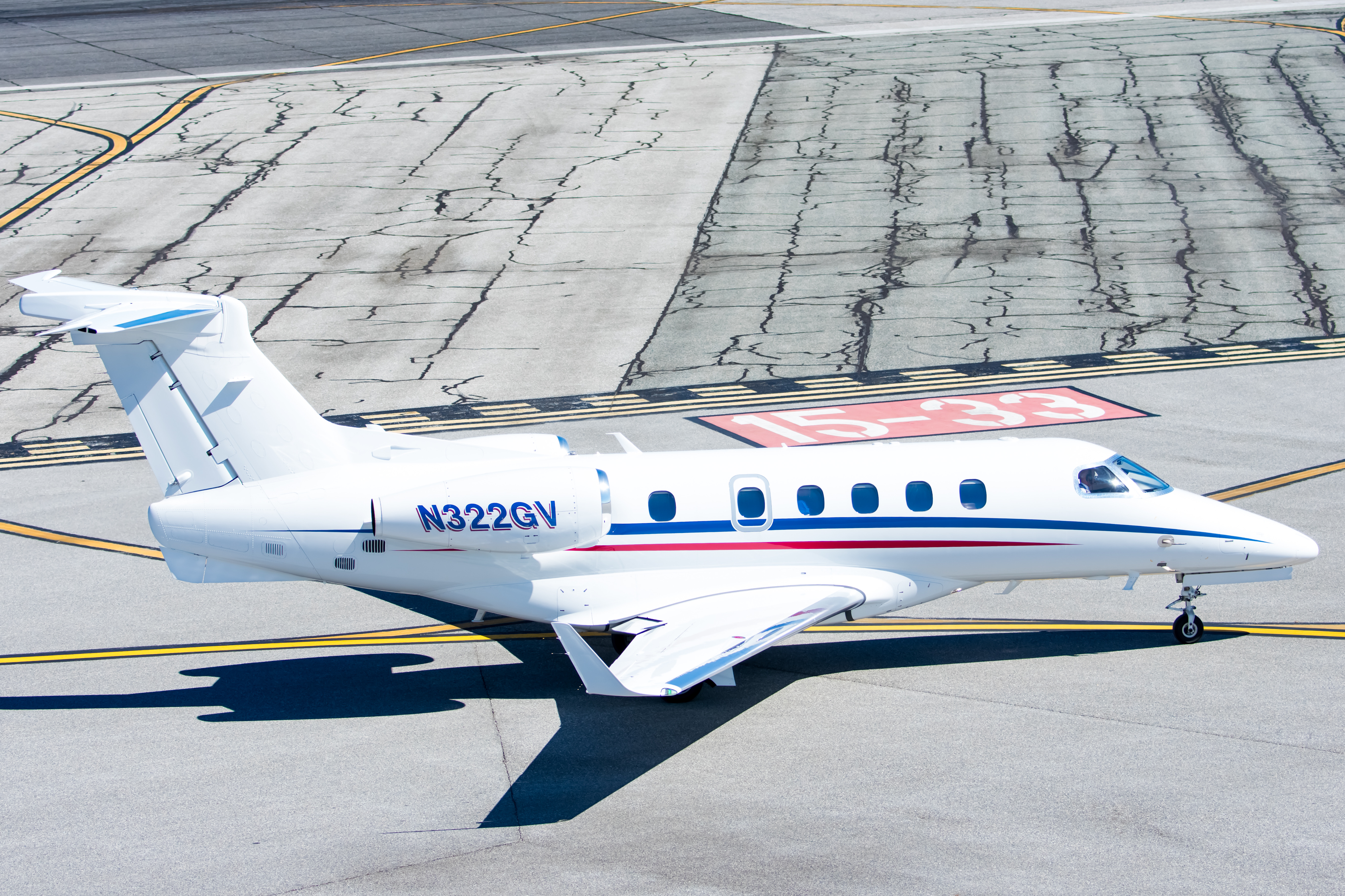 Full size: PRIVATE Embraer Phenom 300 N322GV at Martin State Airport