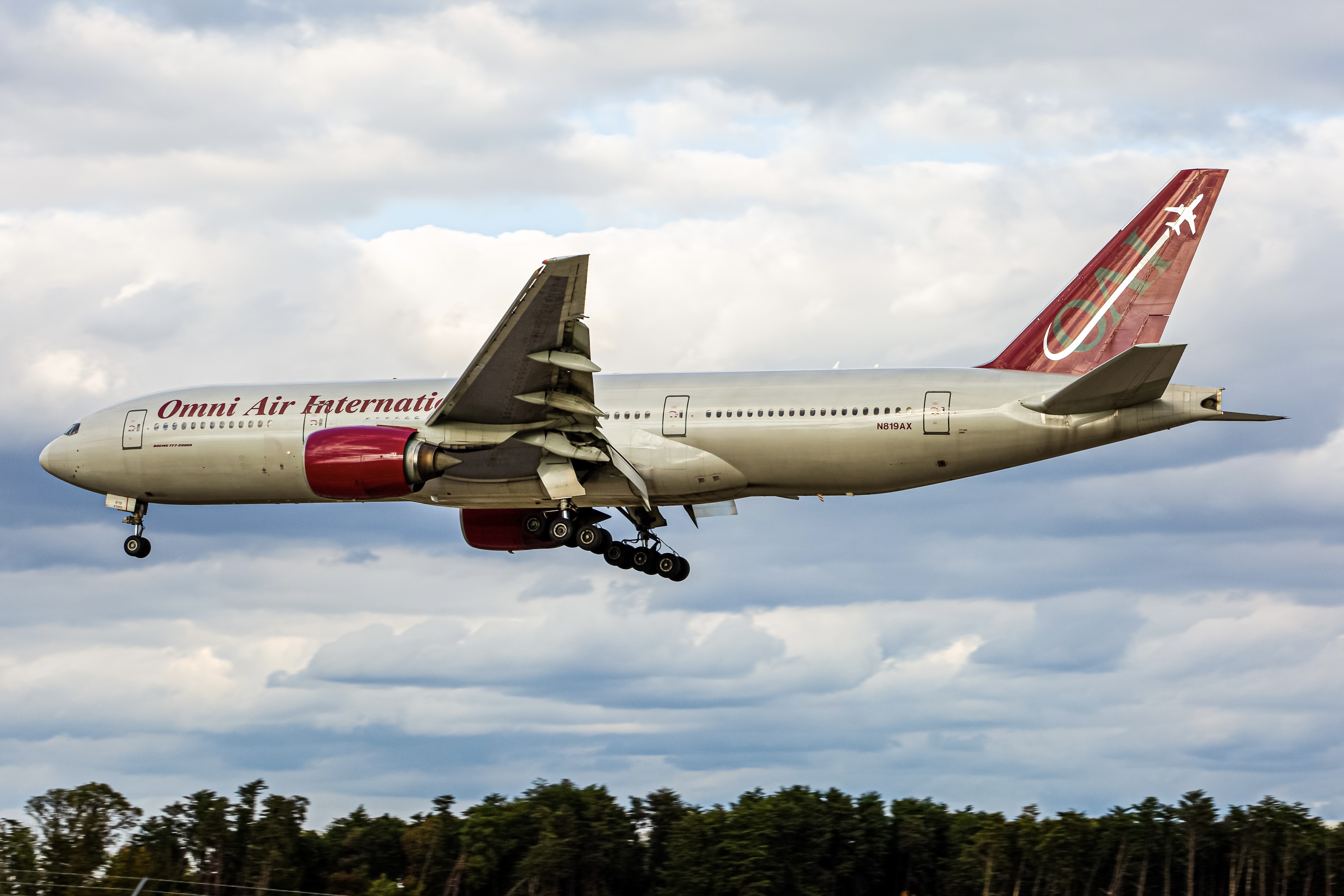 Full size: Omni Air International Boeing 777-200ER N819AX at Baltimore/Washington International Thurgood Marshall Airport