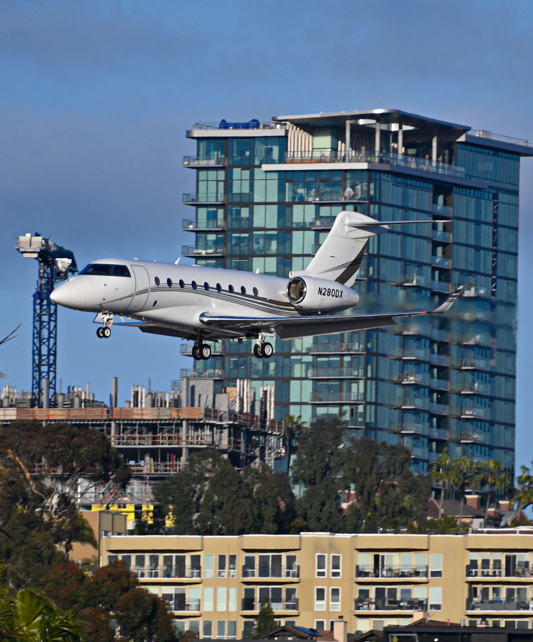 Full size: PRIVATE  Gulfstream G280 N280DX at San Diego International Airport