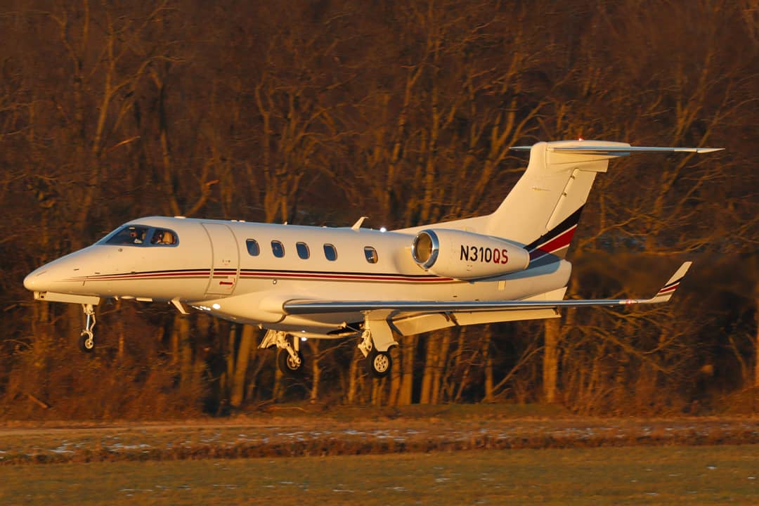 Full size: NetJets Embraer Phenom 300 N310QS at John Glenn Columbus International Airport