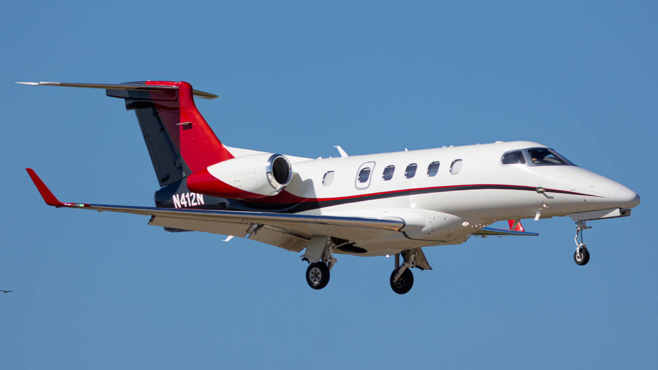 Full size: PRIVATE Embraer Phenom 300 N412N at Naples Municipal Airport