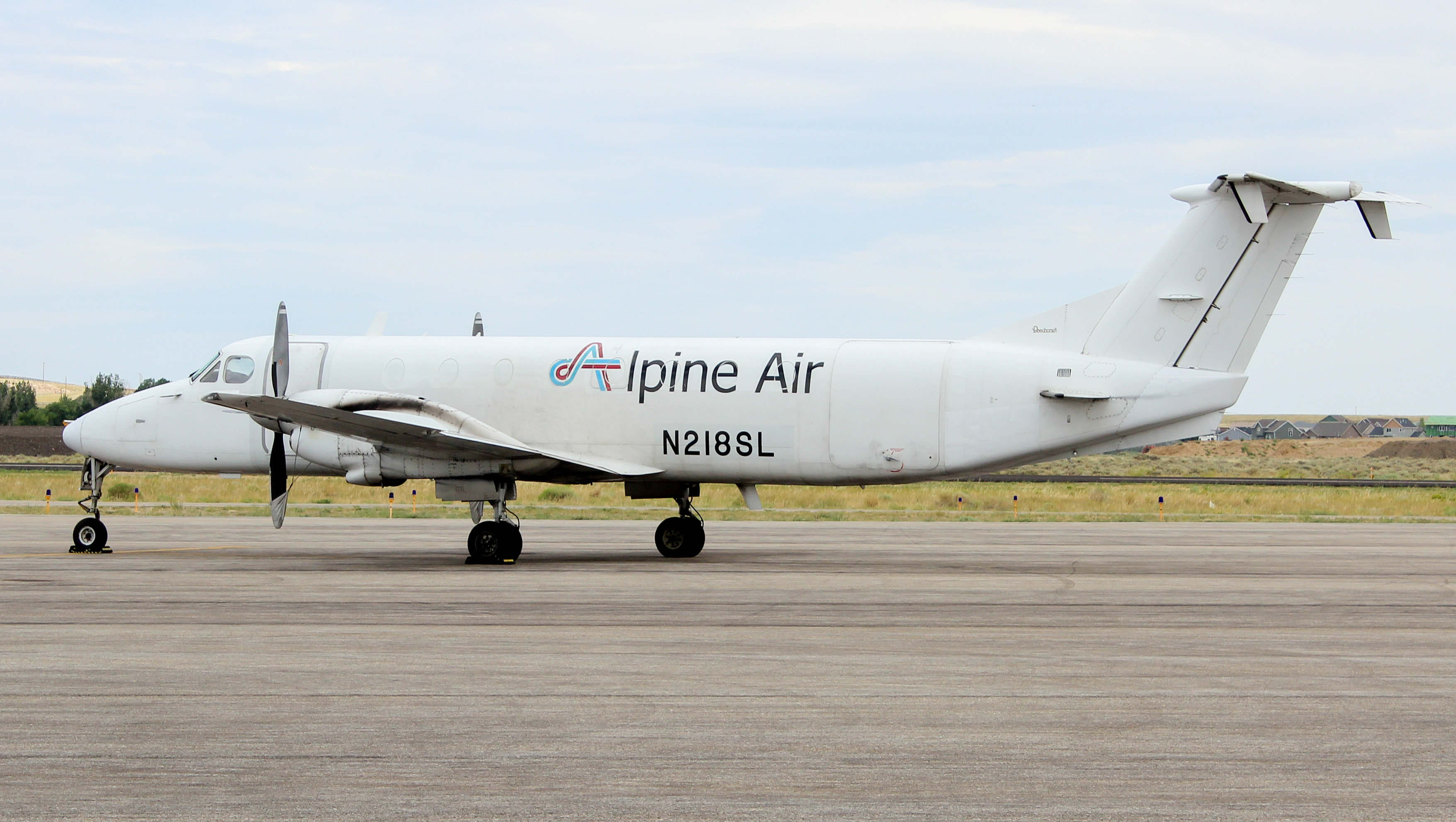 Full size: Alpine Air Beechcraft 1900 N218SL at Rawlins Municipal Airport