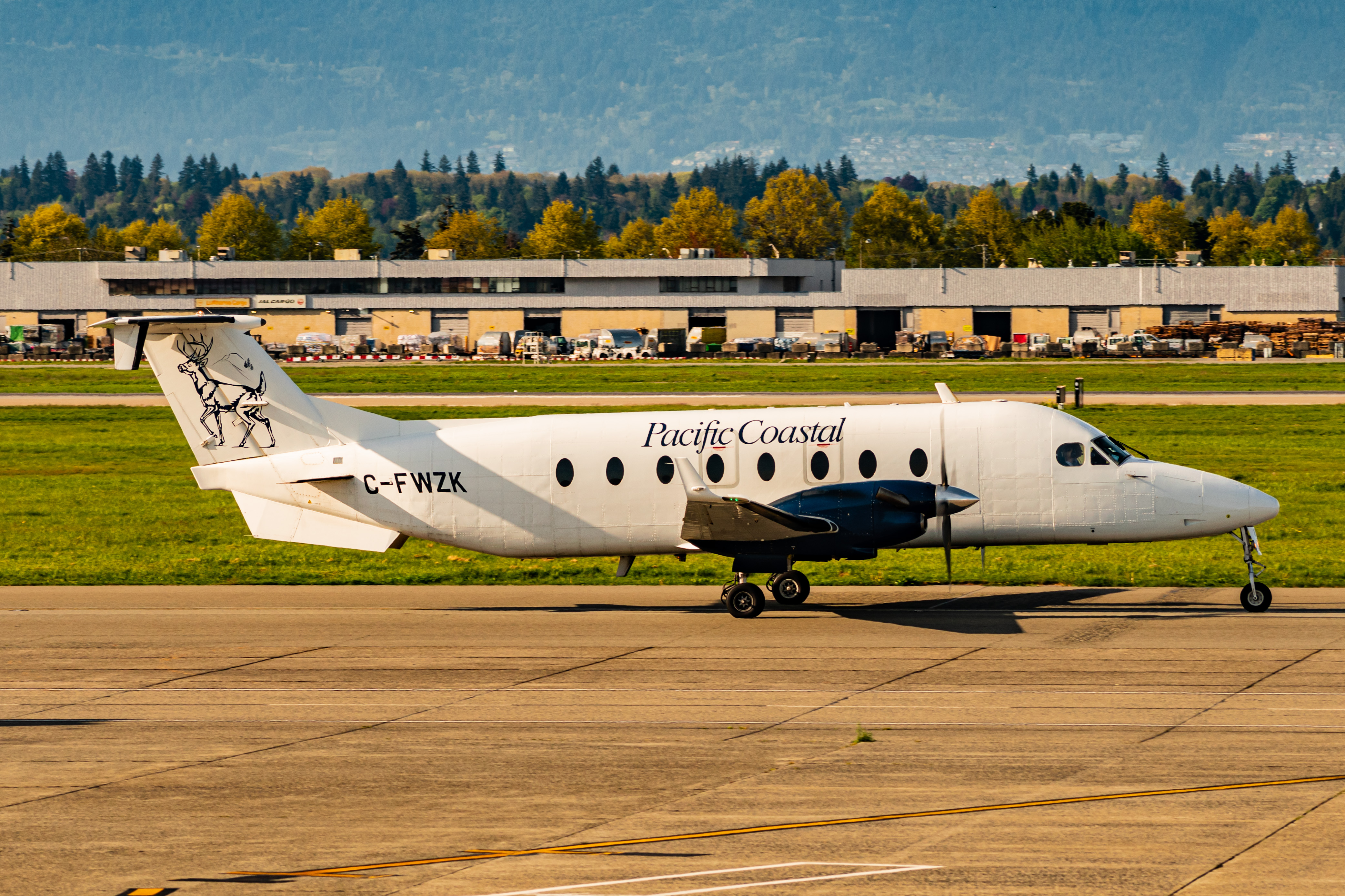 Full size: Pacific Coastal Airlines  Beechcraft 1900 C-FWZK at Vancouver International Airport