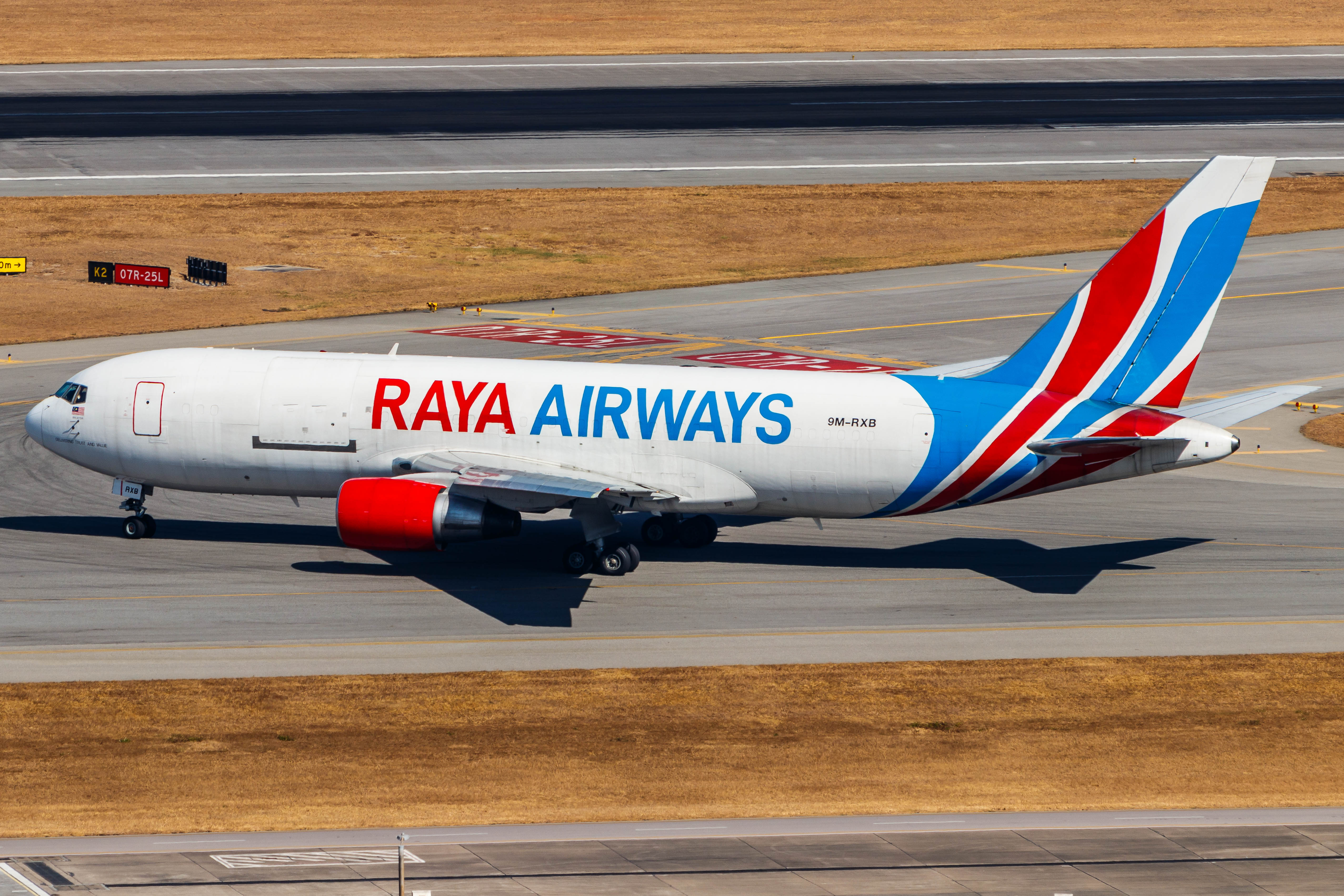 Full size: Raya Airways Boeing 767-200F 9M-RXB at Hong Kong International Airport