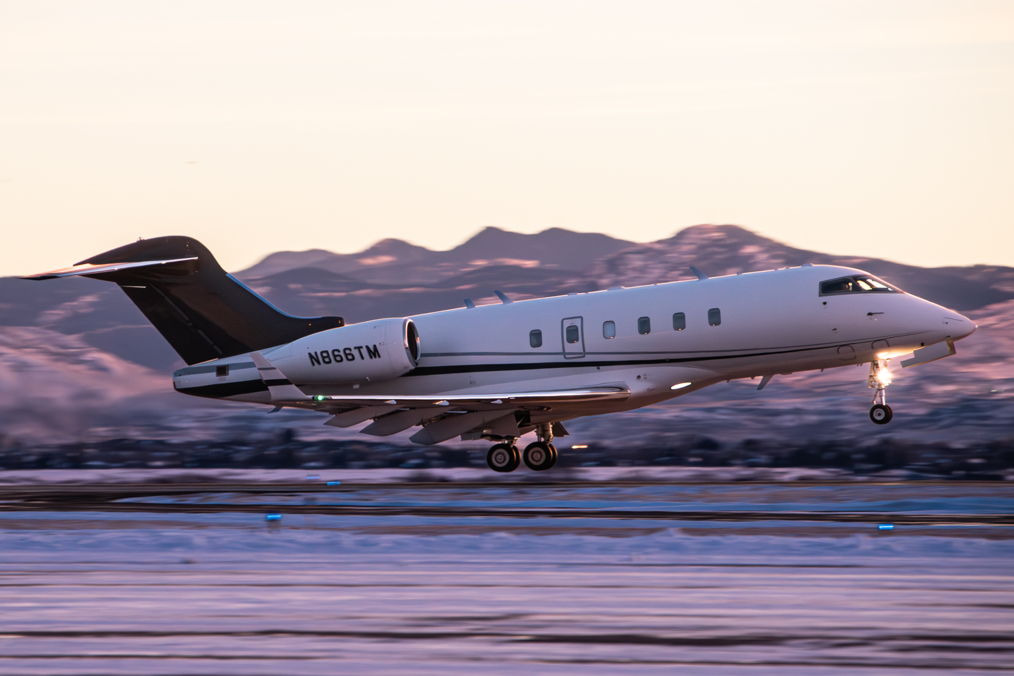 Full size: PRIVATE  Bombardier Challenger 300 N866TM at Rocky Mountain Metro Airport