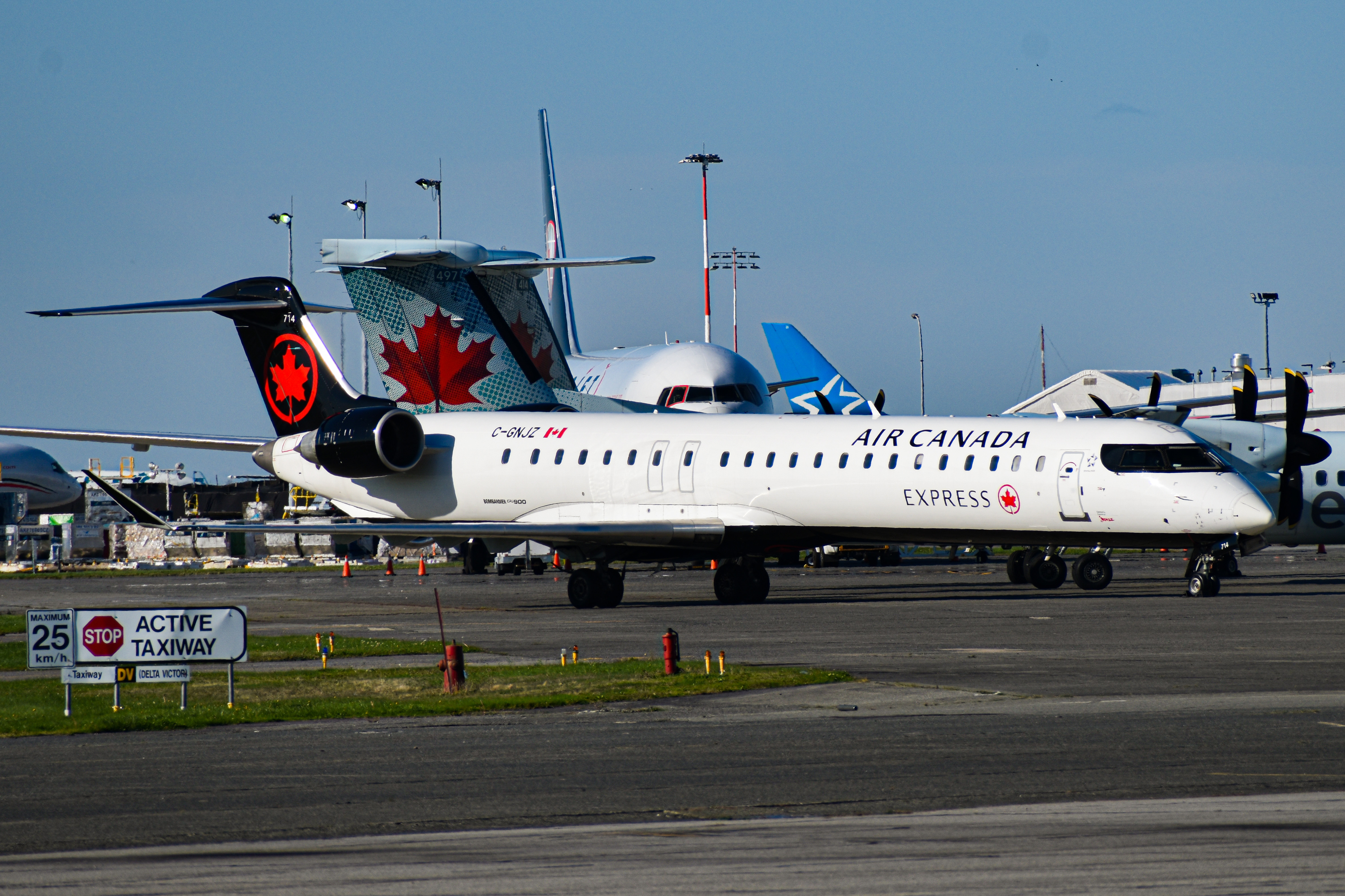 Full size: Air Canada Express Mitsubishi CRJ-900LR C-GNJZ at Vancouver International Airport