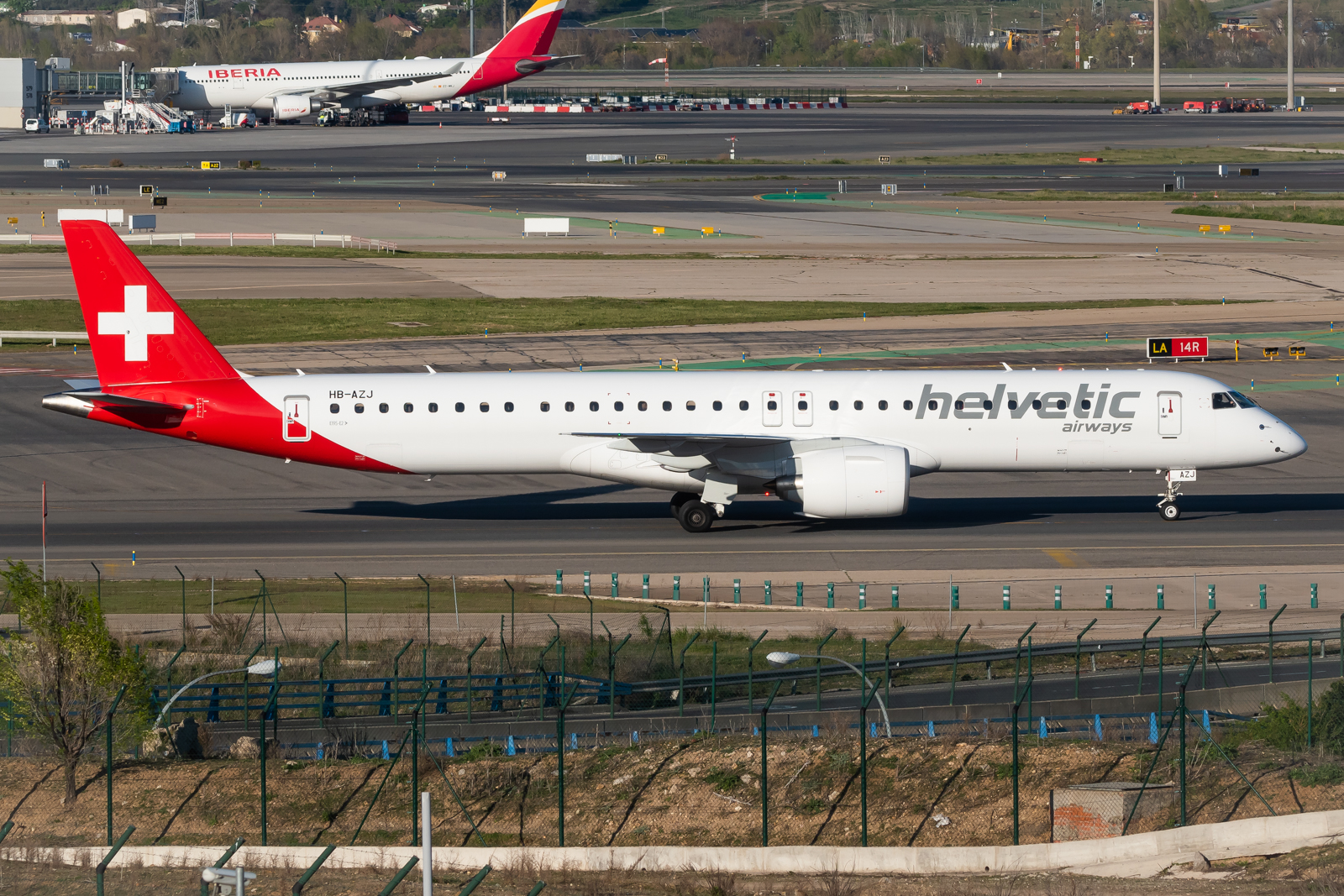 Full size: Helvetic Airways Embraer E195-E2 HB-AZJ at Madrid Barajas Airport