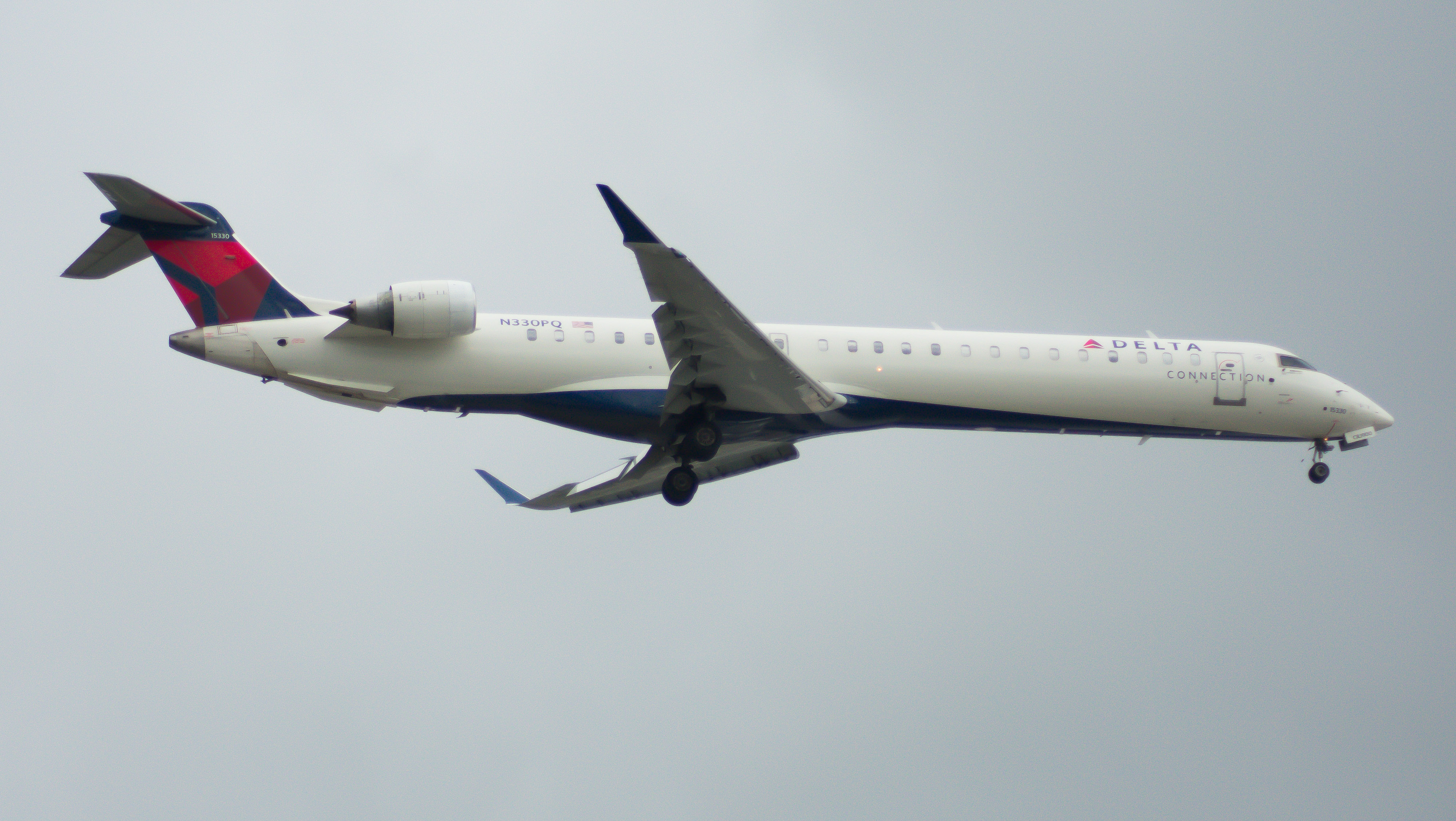 Full size: Delta Connection Mitsubishi CRJ-900 N330PQ at Chicago O'Hare International Airport