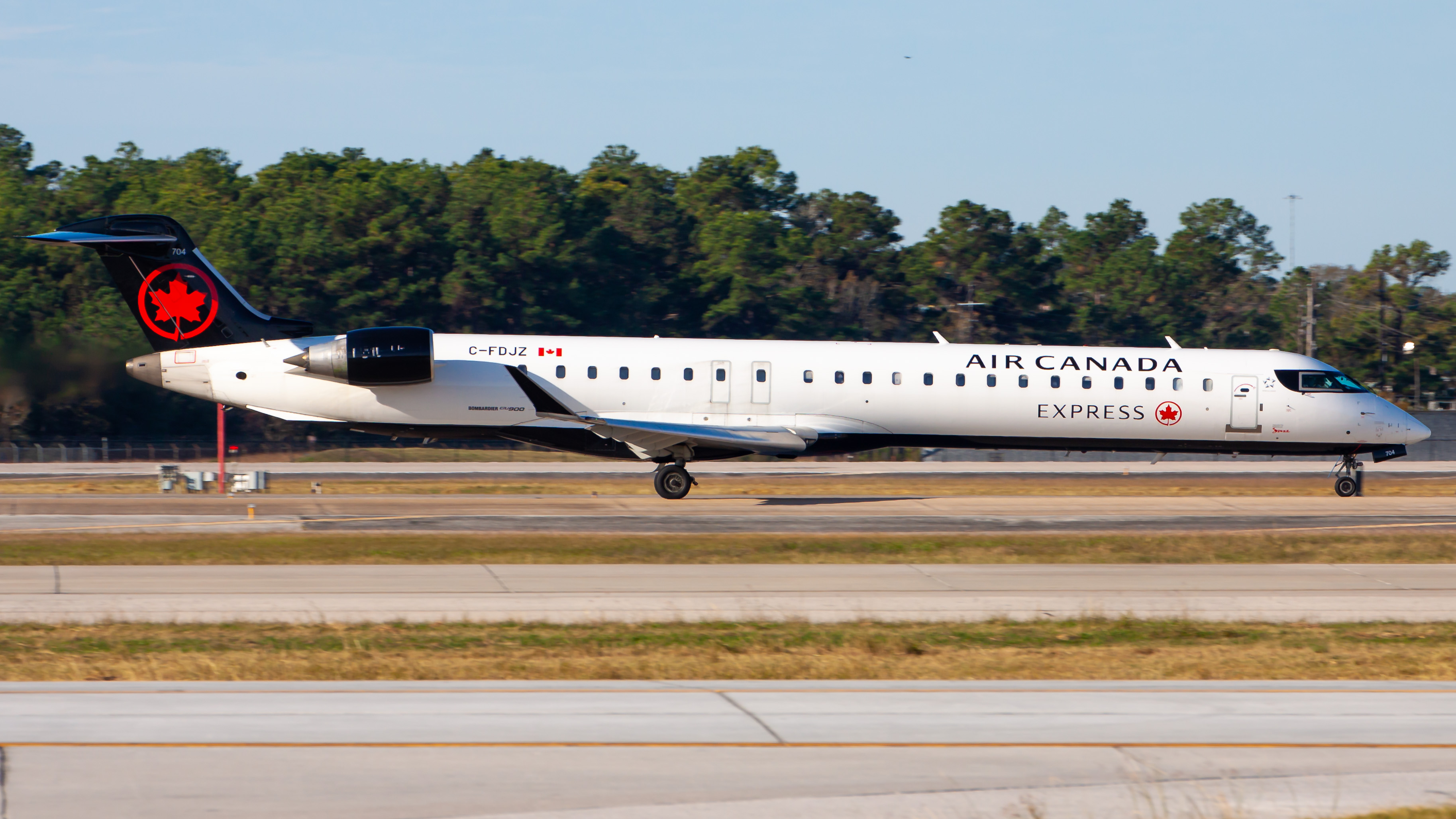 Full size: Air Canada Express Mitsubishi CRJ-900 C-FDJZ at Houston-George Bush Intercontinental Airport