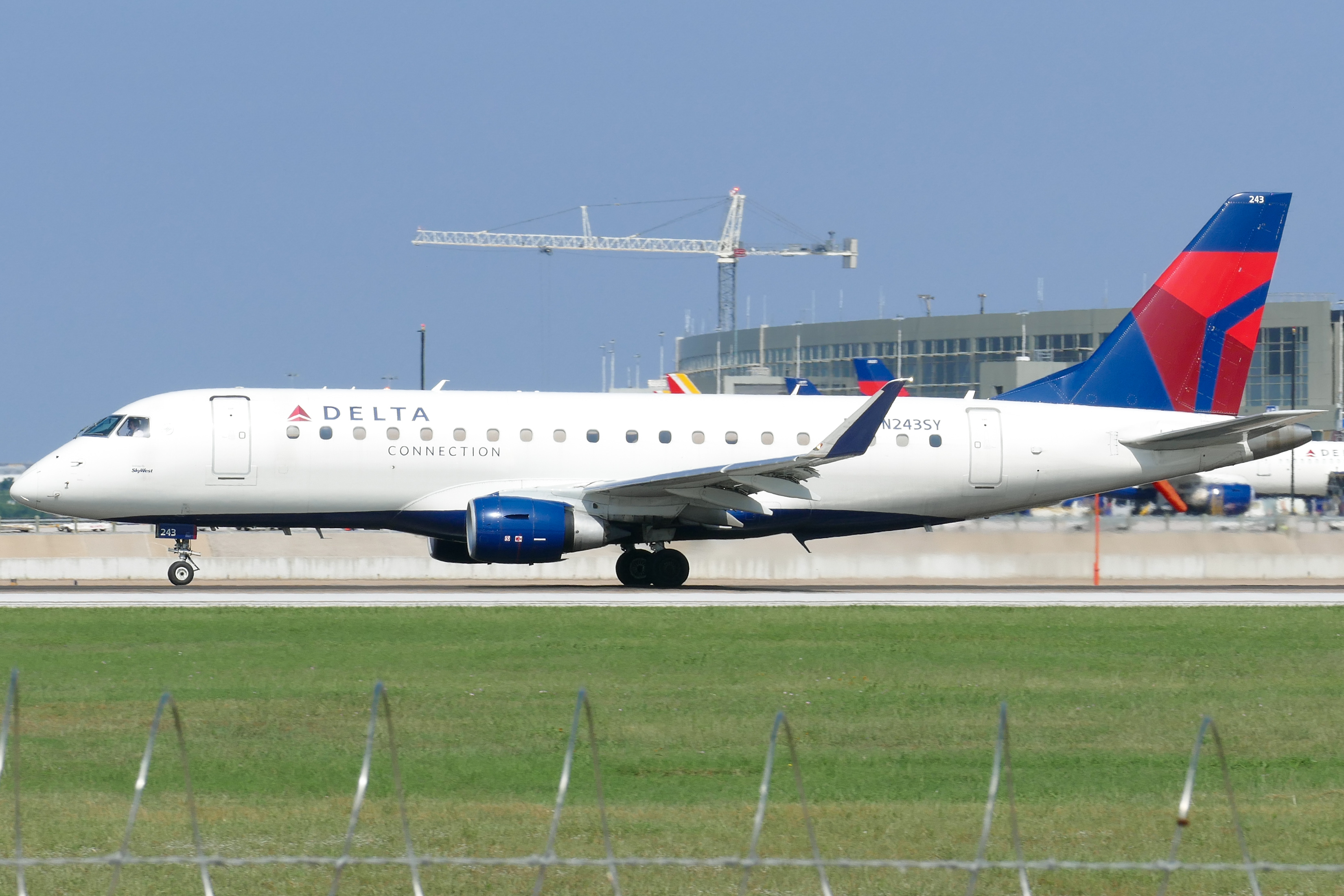 Full size: Delta Connection Embraer E175 N243SY at Austin-Bergstrom International Airport