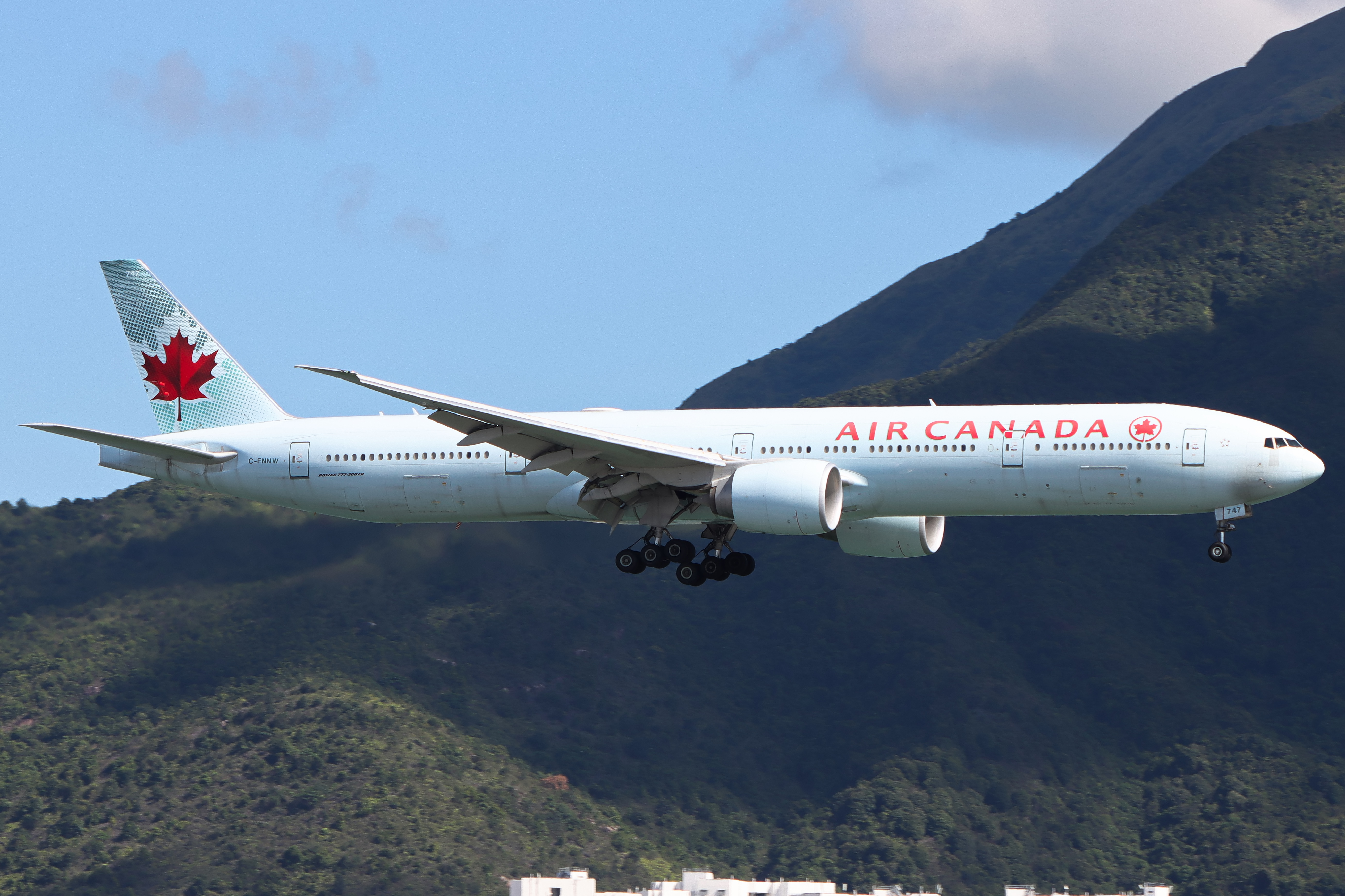 Full size: Air Canada Boeing 777-300ER C-FNNW at Hong Kong International Airport
