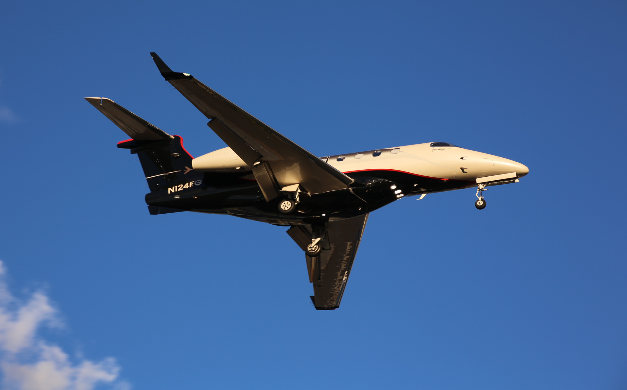 Full size: PRIVATE Embraer Phenom 300 N124FG at Teterboro Airport