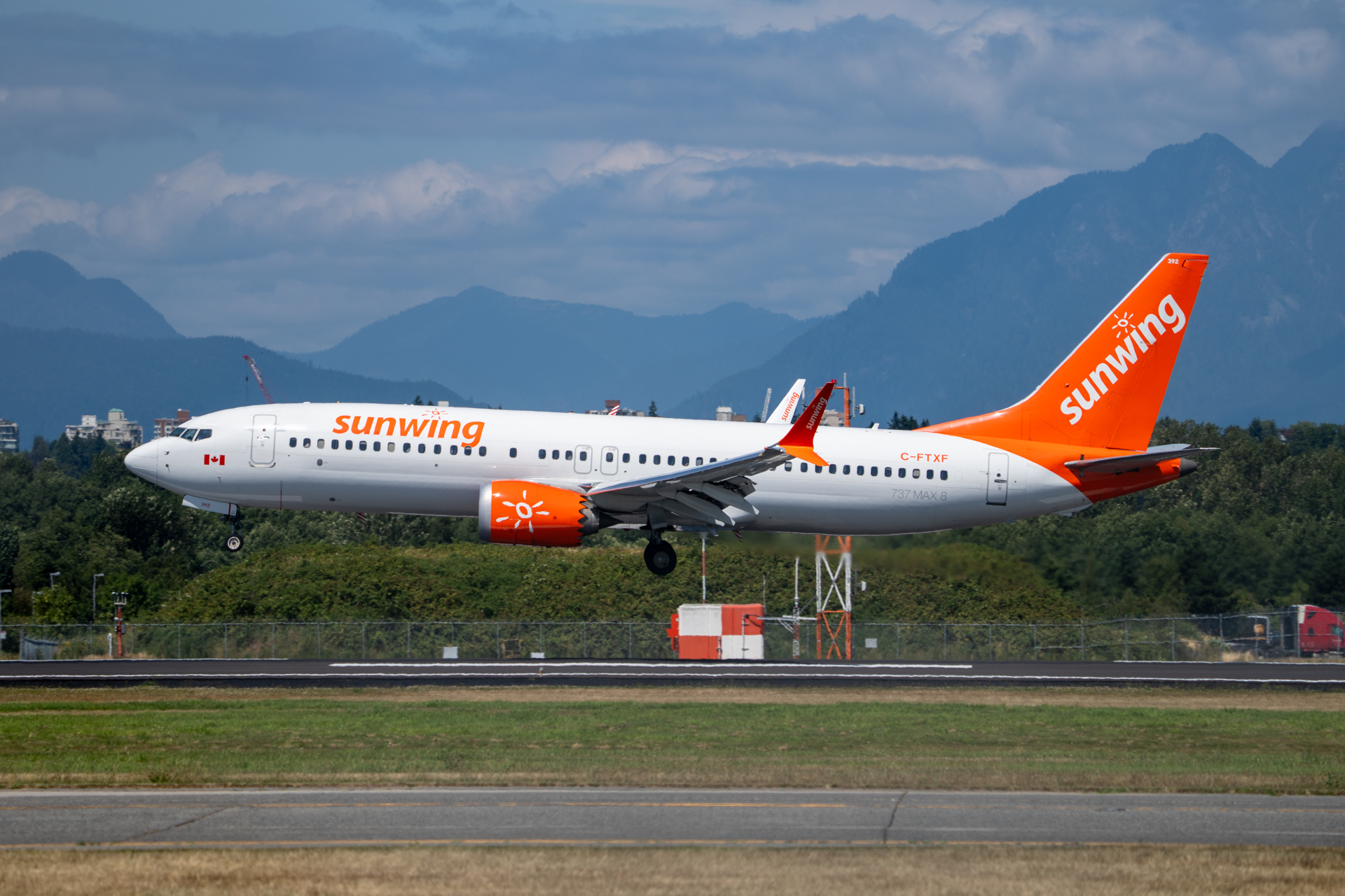 Full size: Sunwing Airlines Boeing 737 MAX 8 C-FTXF at Vancouver International Airport