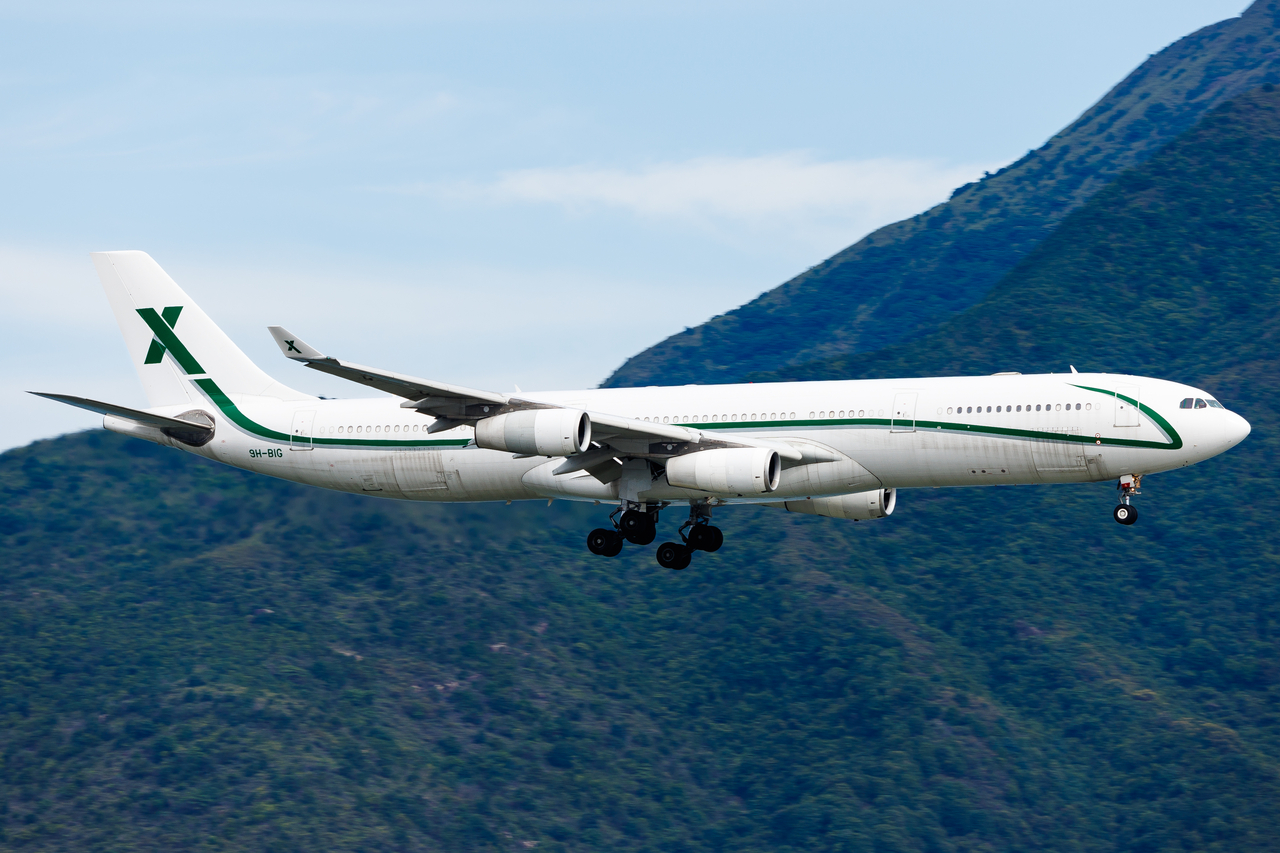 Full size: Air X Charter Airbus A340-300 9H-BIG at Hong Kong International Airport