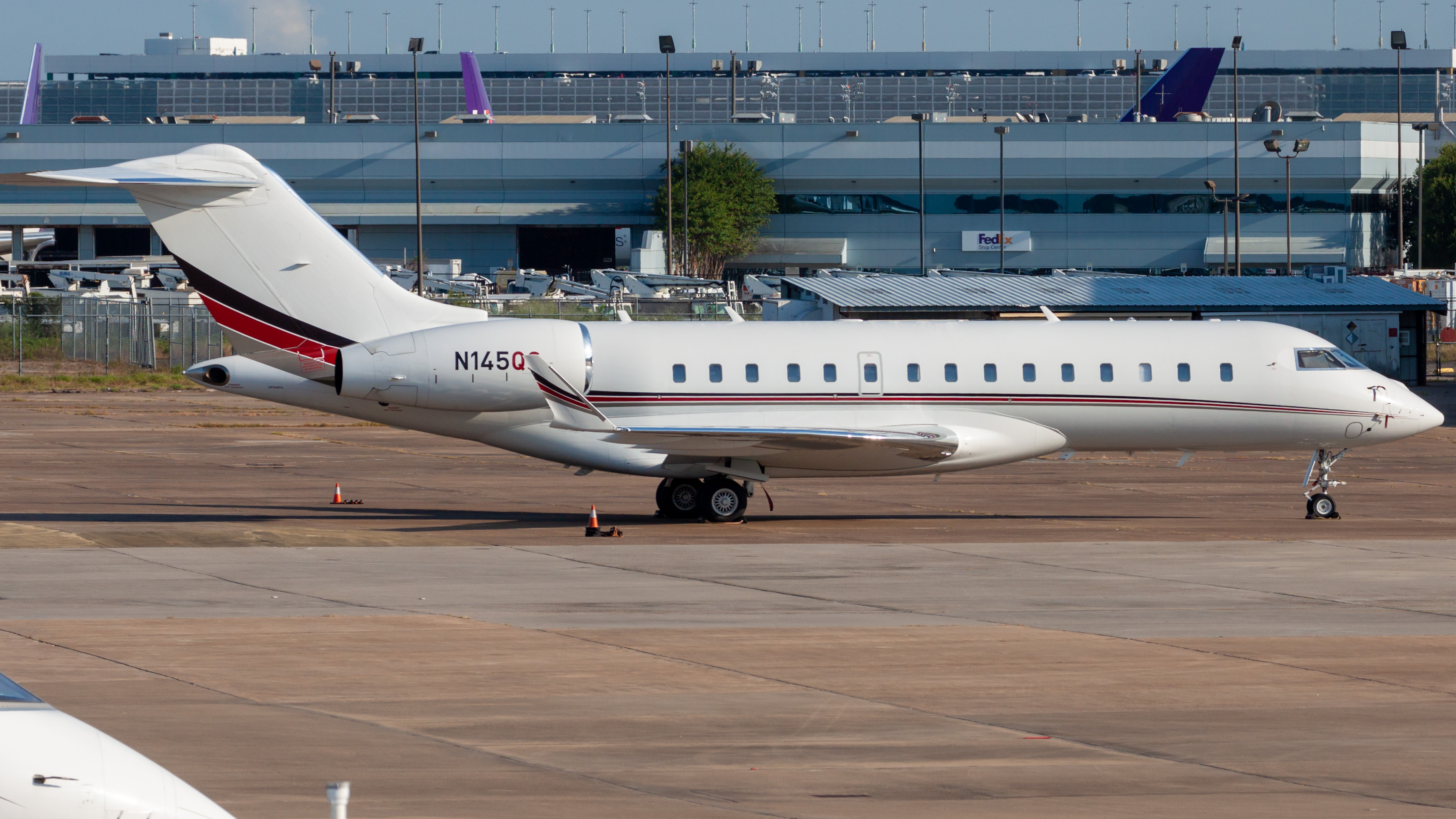 Full size: NetJets Bombardier Global 6000 N145QS at Houston-George Bush Intercontinental Airport