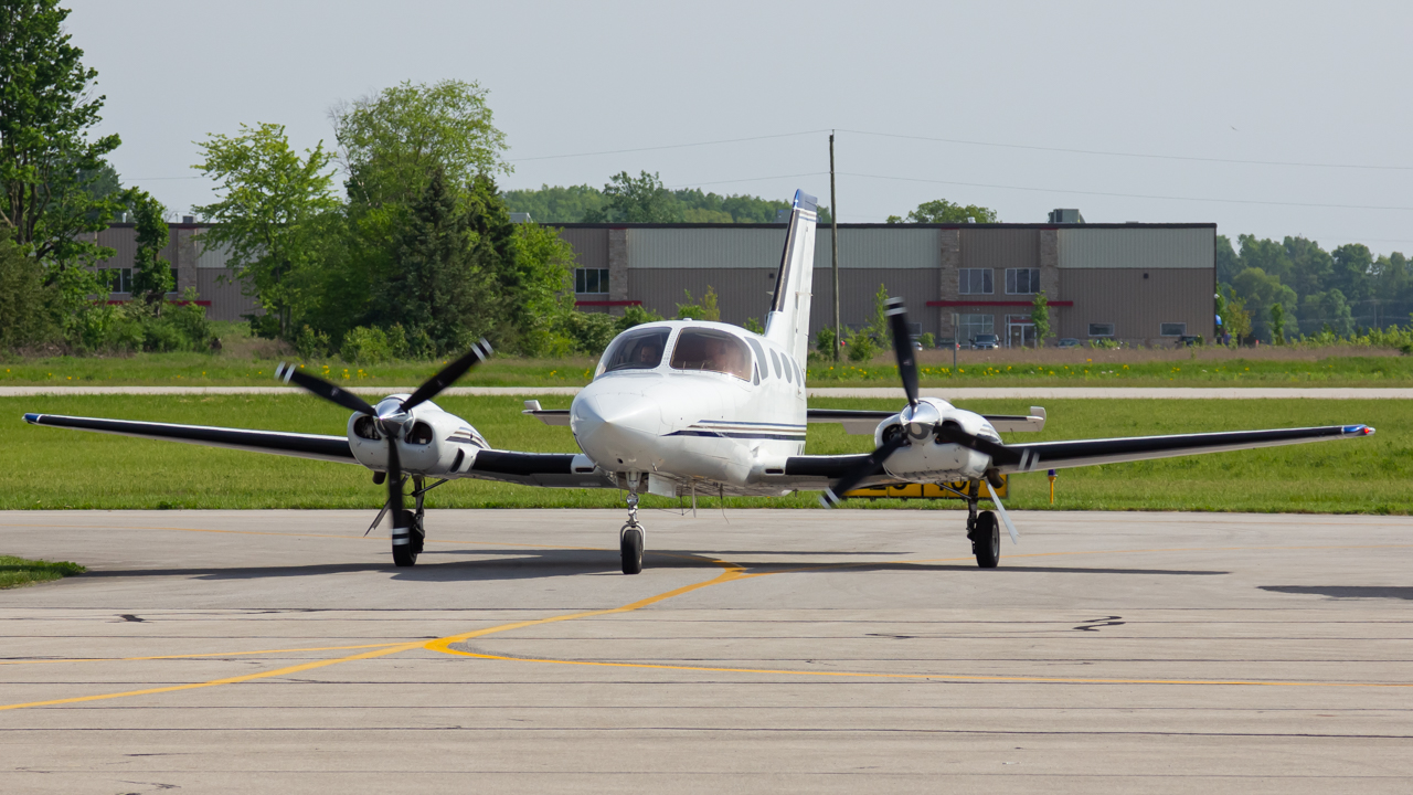 Full size: PRIVATE Cessna 421 N421DB at Delaware Municipal Airport