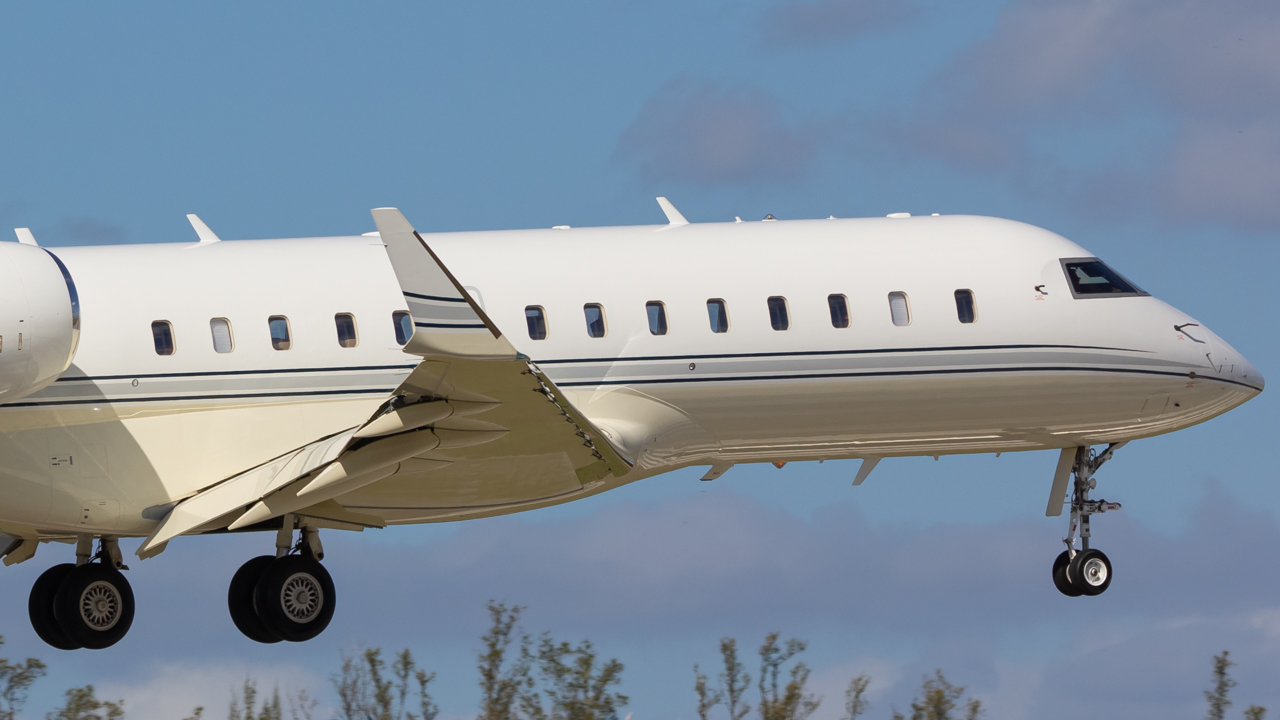 Full size: PRIVATE Bombardier Global 5000 N702LK at Naples Municipal Airport