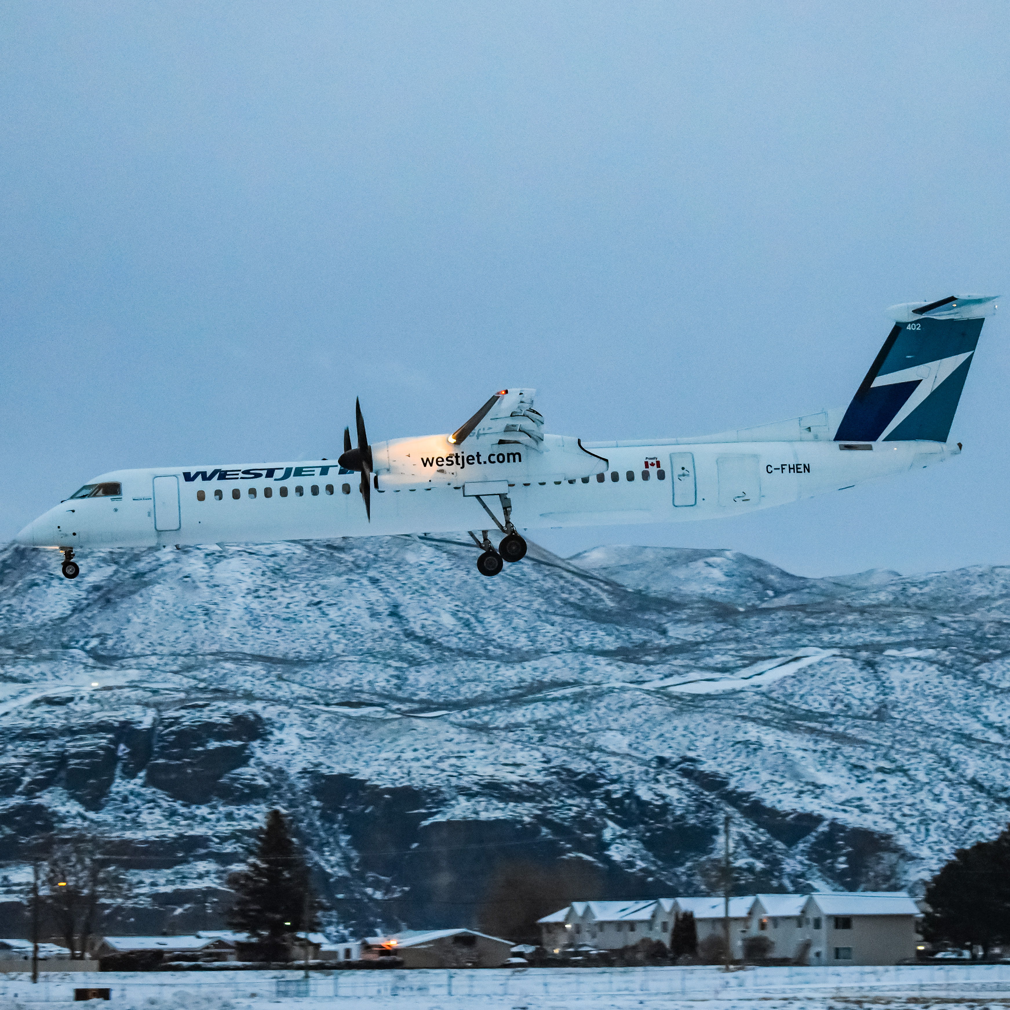 Full size: WestJet Encore Bombardier Dash 8-400 C-FHEN at Kamloops Airport