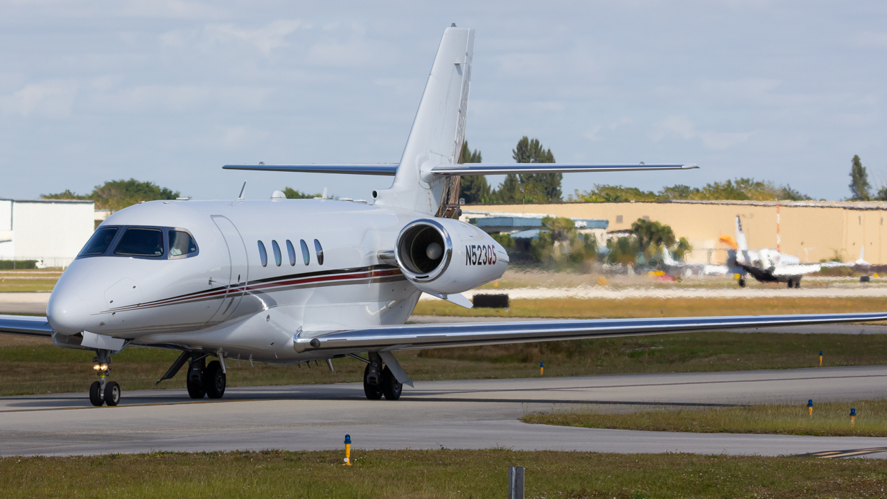 Full size: NetJets Cessna Citation Latitude N523QS at Naples Municipal Airport