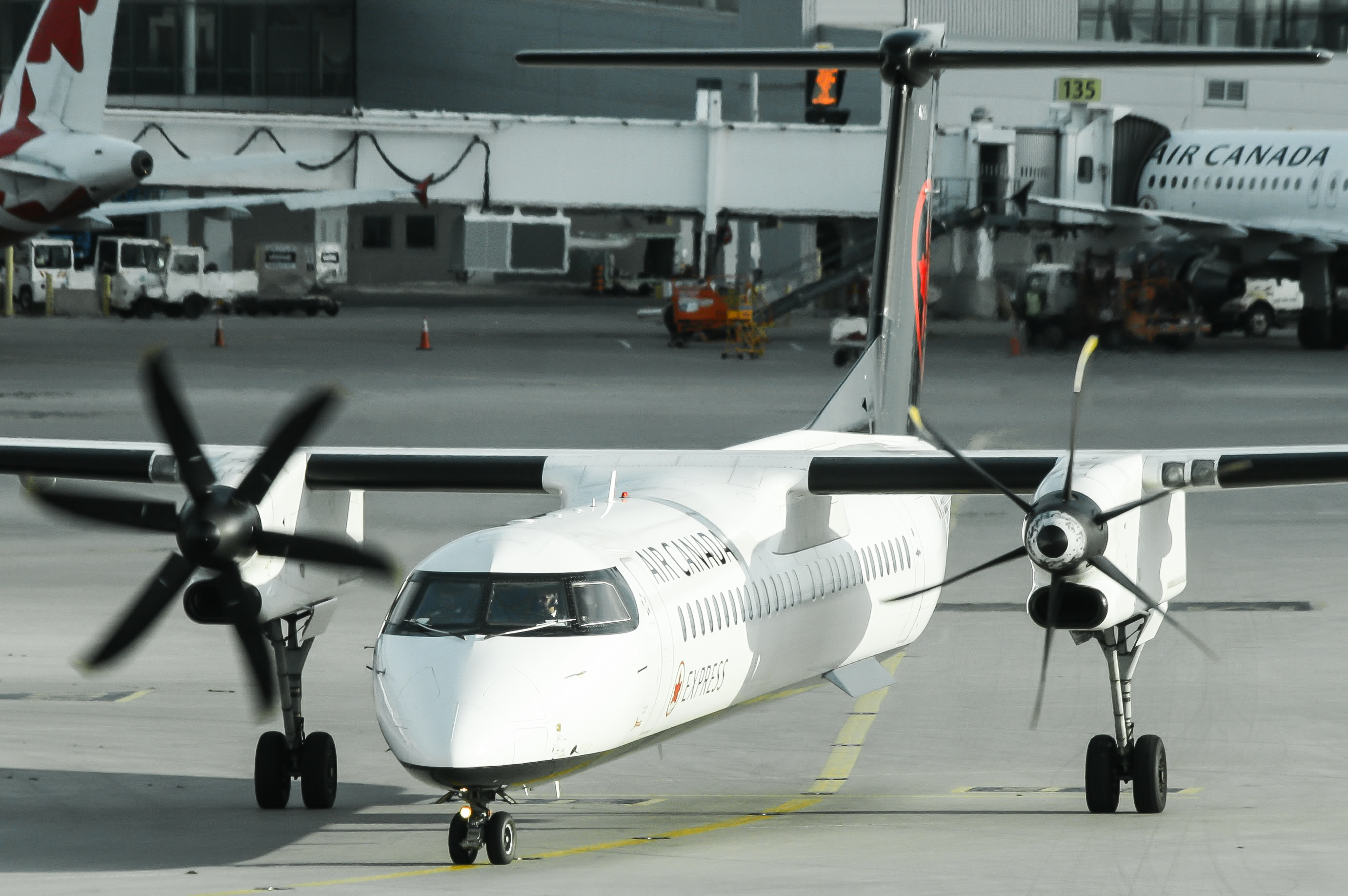 Full size: Air Canada Express De Havilland Dash-8 Q400 C-GSJZ at Lester B Pearson International Airport