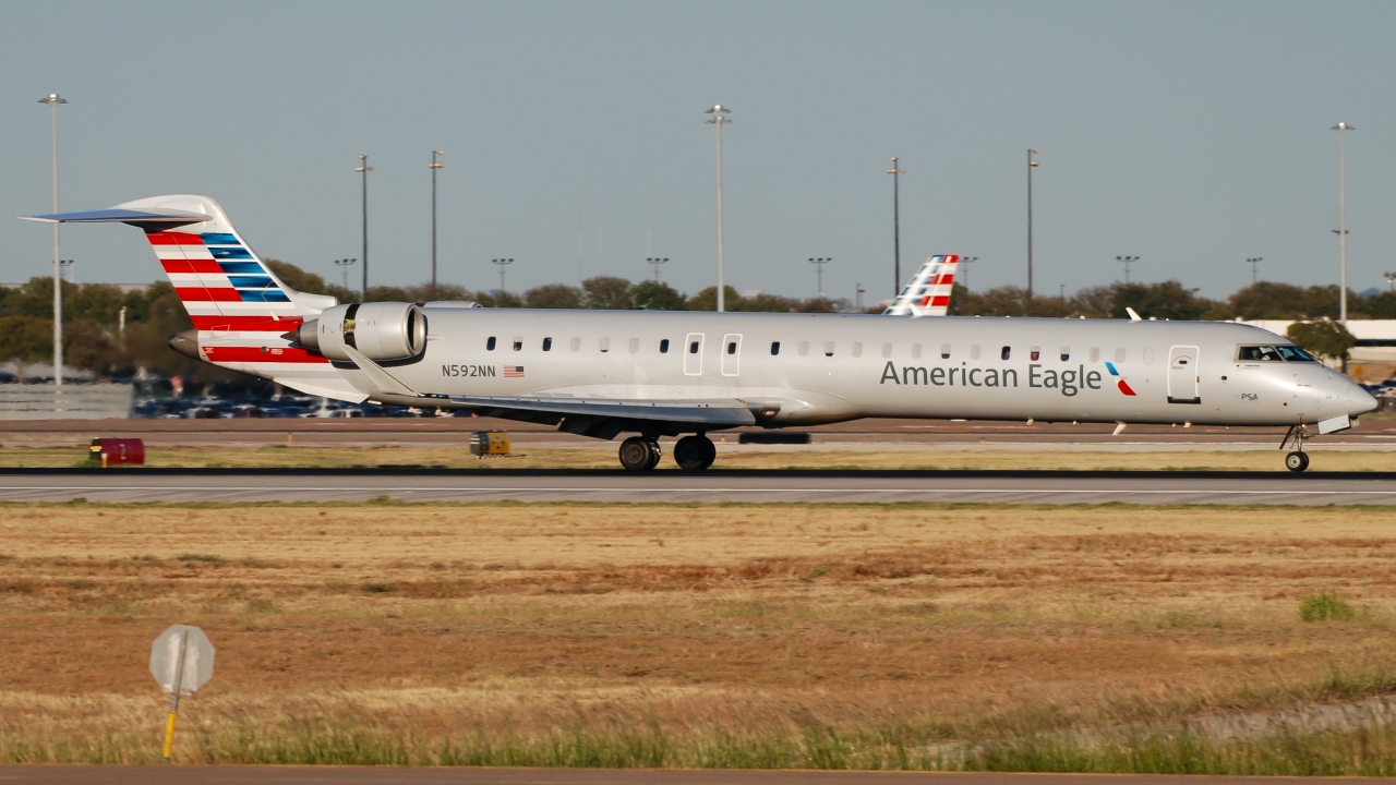 Full size: PSA Airlines Mitsubishi CRJ-900 N592NN at Dallas-Fort Worth International Airport